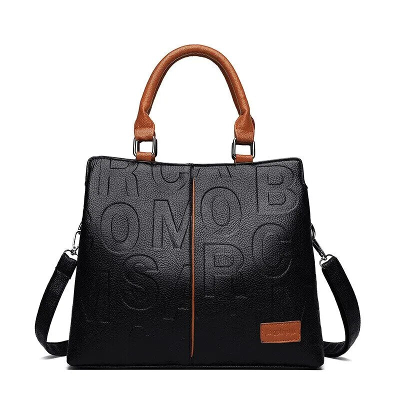 2023 New Fashion Solid Color Shoulder Large Capacity Soft Leather Cloth Letter Embossed Ladies Handbag